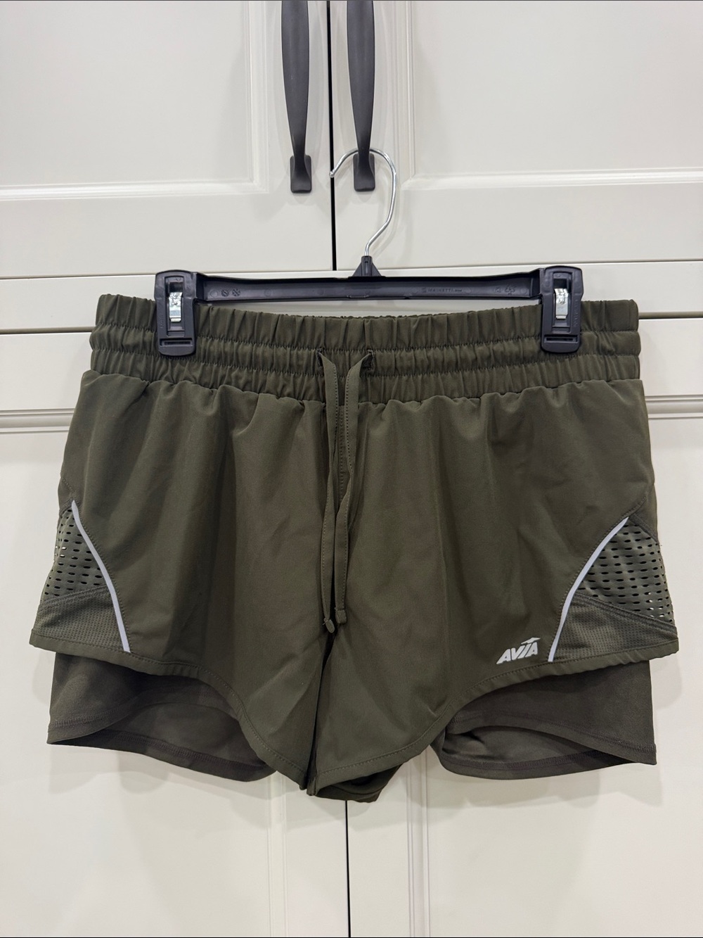 Avia Running shorts Women’s Medium  (8-10). Olive Green Color.